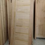 Porte bois rouge bonne qualité sans cadre